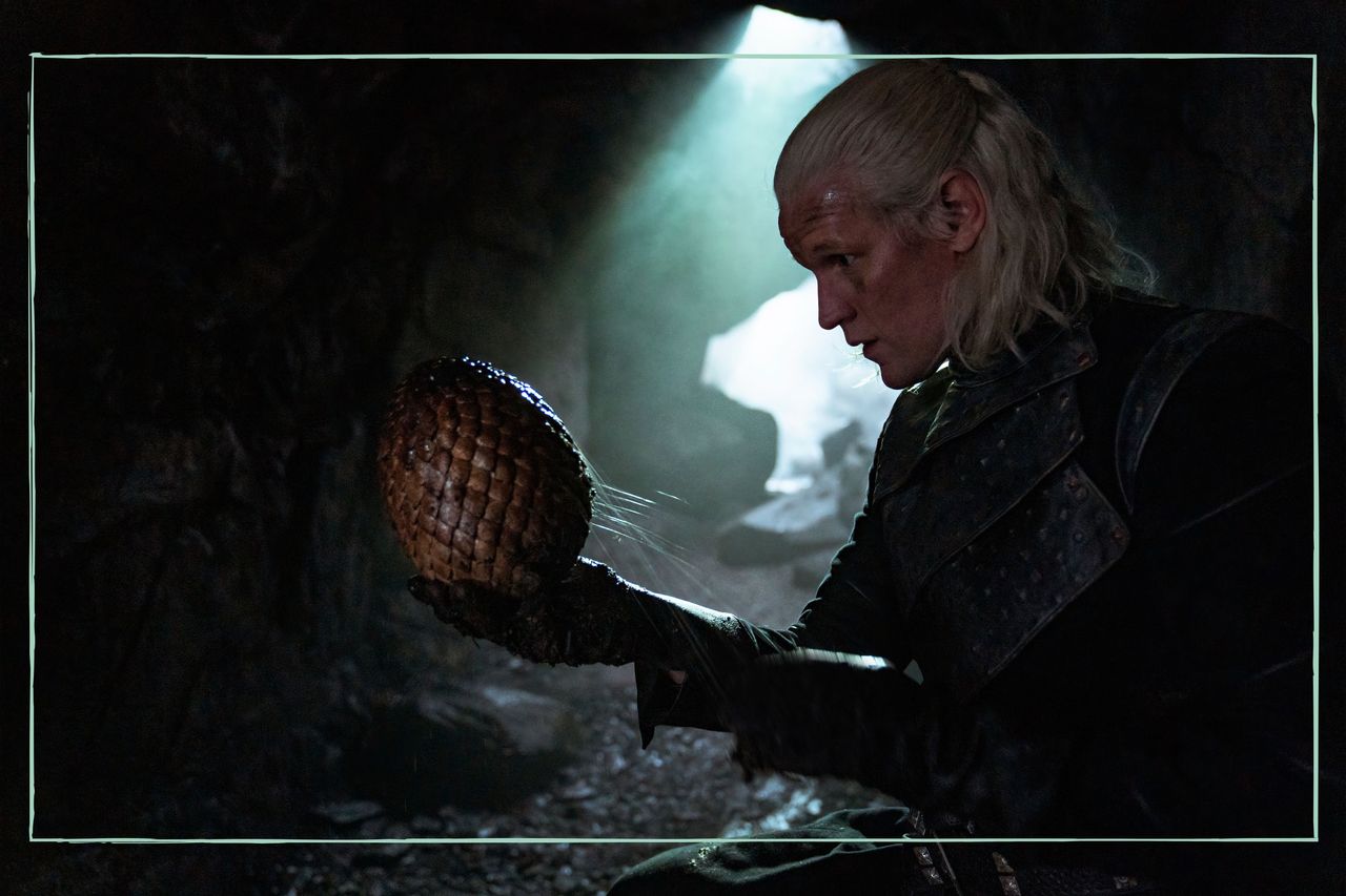 a still of Matt Smith holding a dragon&#039;s egg in House of the Dragon