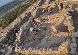 The excavation of a shrine in the 3,000-year-old city of Khirbet Qeiyafa near Jerusalem.