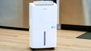 Waykar 34 Pint dehumidifier on floor