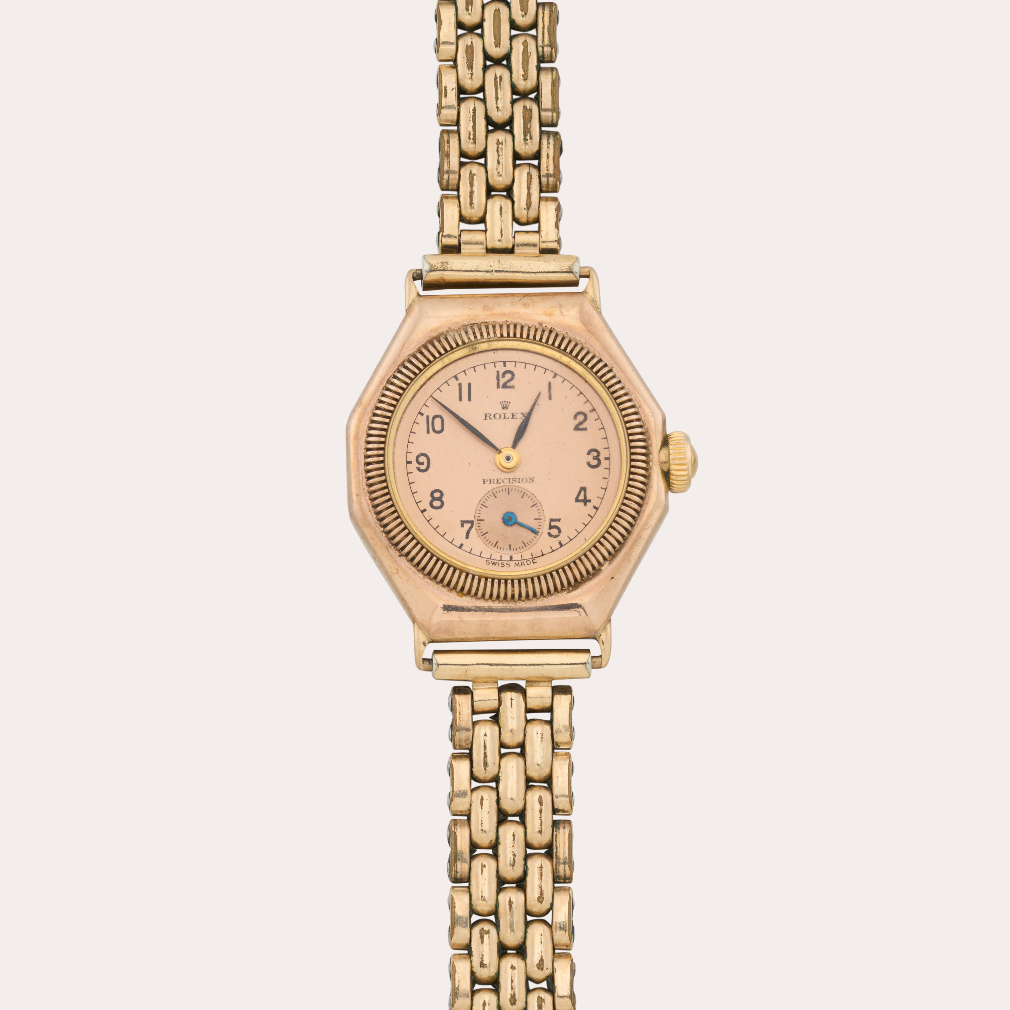 Gold Rolex Oyster watch on gold chain