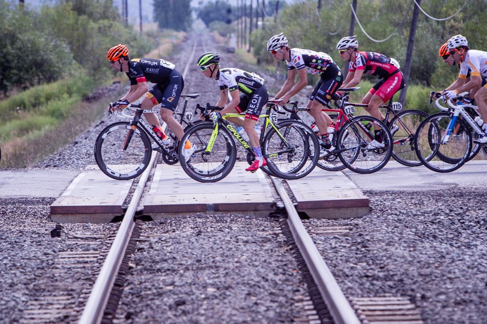 Riders pass over one of the train tracks along todays route