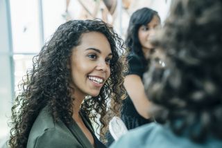 smiling businesswoman in meeting