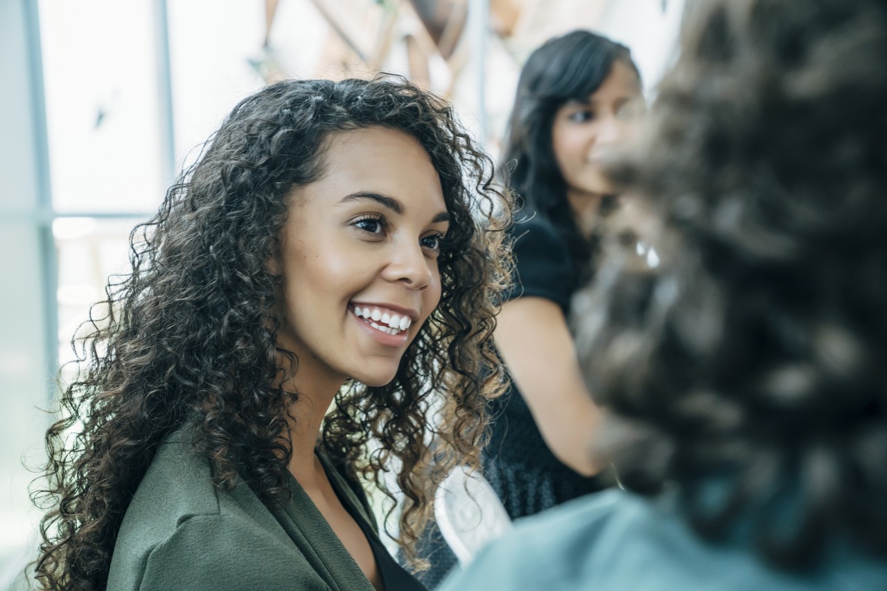 smiling businesswoman in meeting