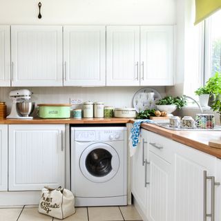 White kitchen with washing machine