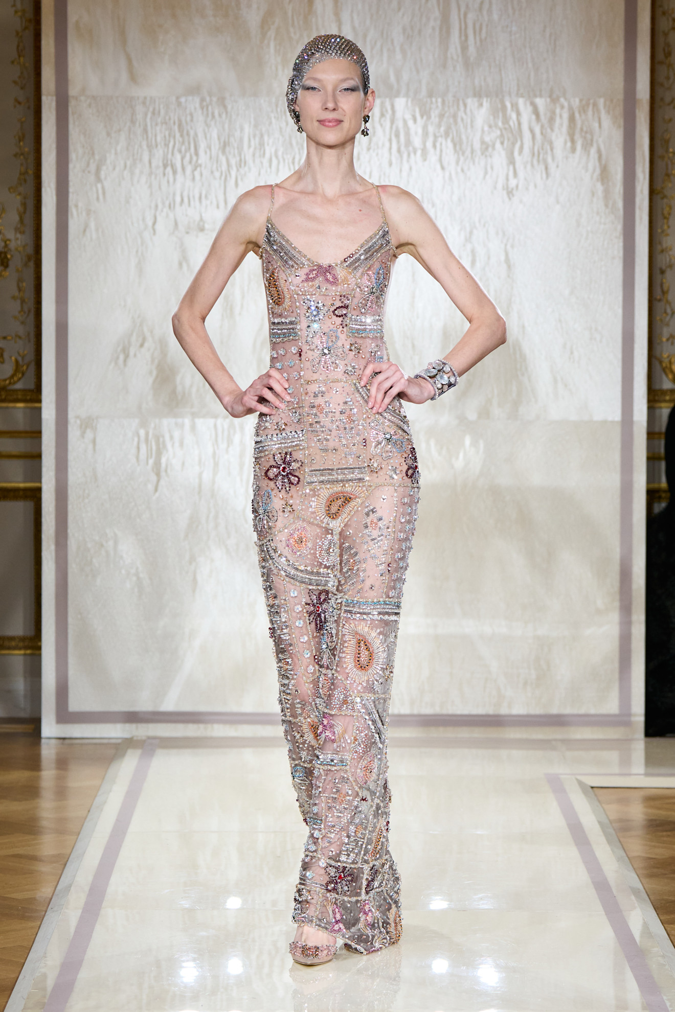 A model wore Margot&#039;s naked dress on the Armani Priv&amp;eacute; Spring 2025 Couture runway.