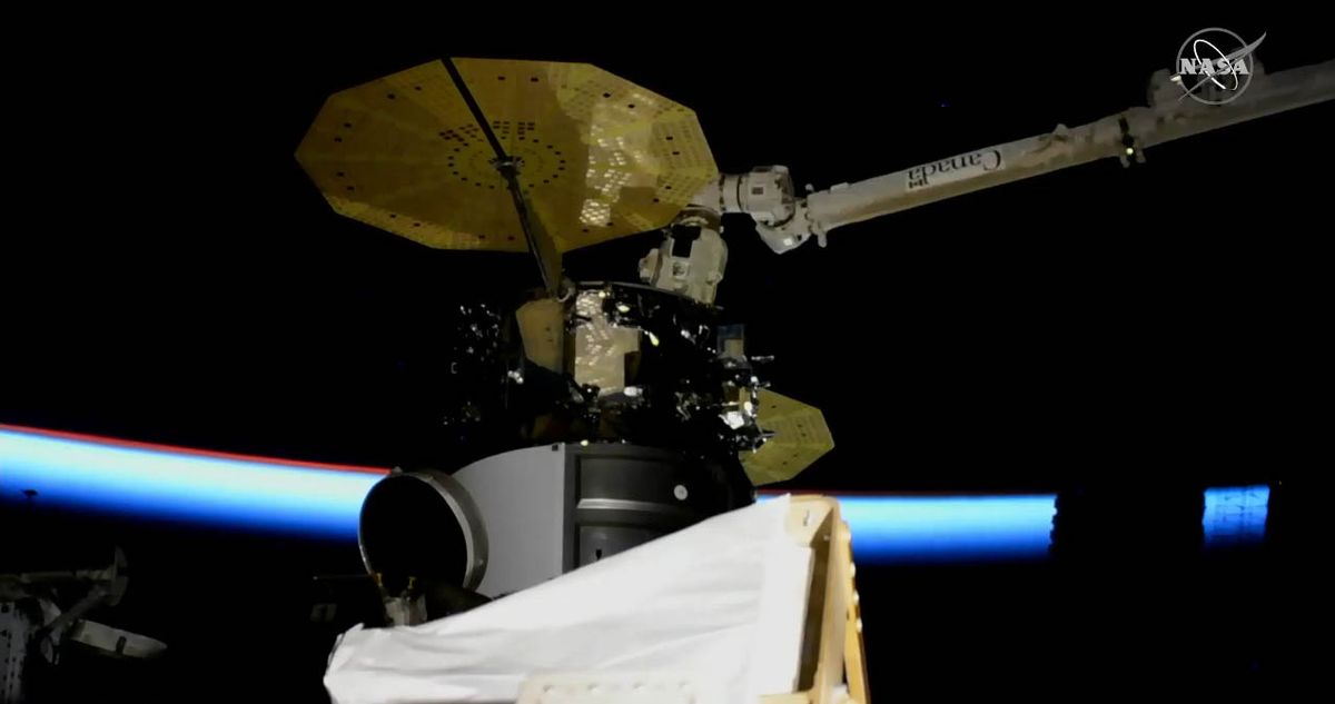 The Cygnus NG-13 cargo ship is connected to the International Space Station's Unity module on an Earth-facing port as a sunset begins in space on Feb. 18, 2020.