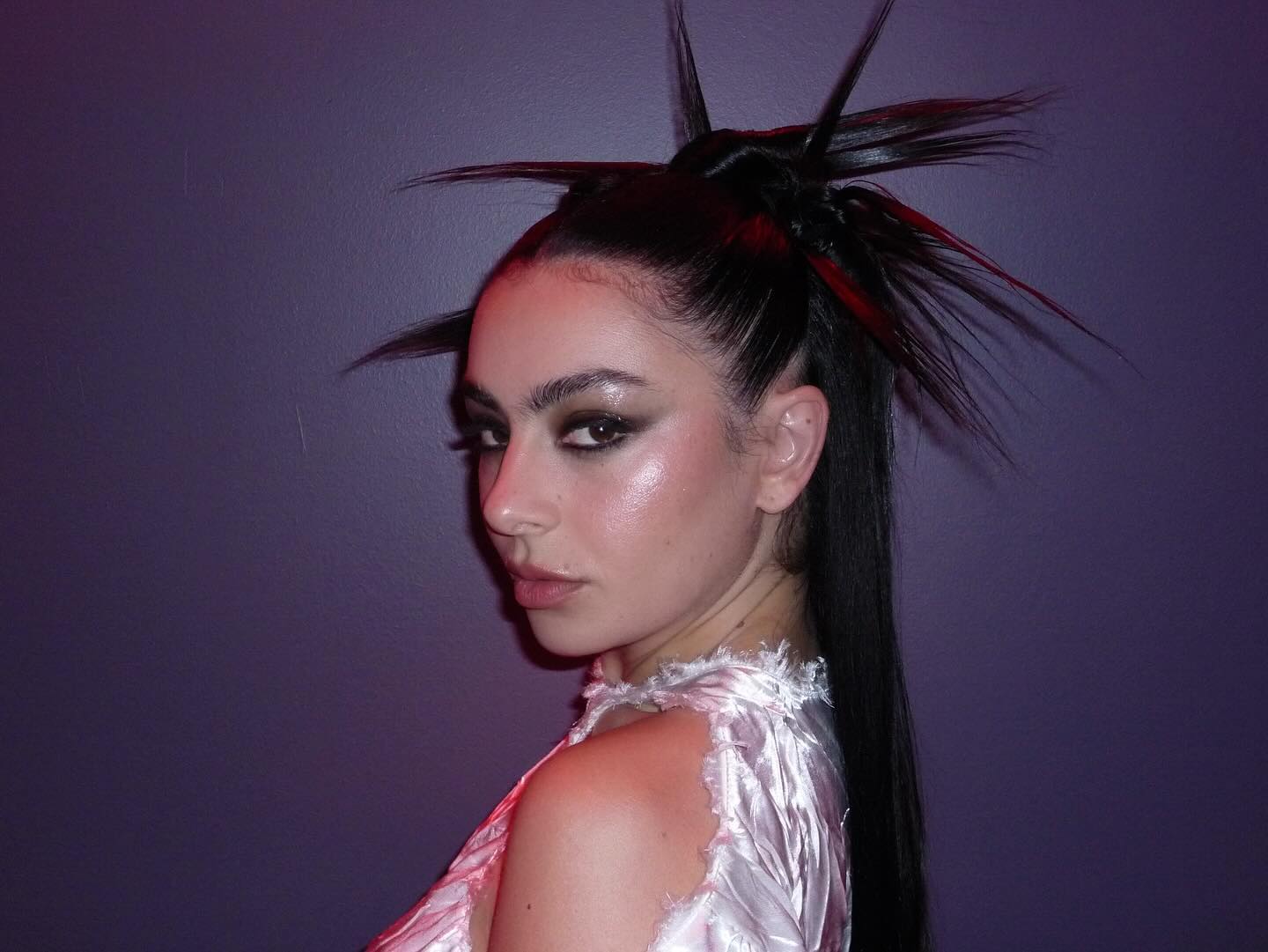 Charli XCX with makeup done by celebrity makeup artist Yasmin Istanbouli.