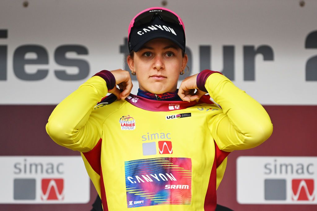 ZEEWOLDE NETHERLANDS OCTOBER 10 Zoe Backstedt of The United Kingdom and Team CanyonSRAM Racing celebrates at podium as Yellow leader jersey winner during the 26th Simac Ladies Tour 2024 Stage 3 a 1484km stage from Zeewolde to Zeewolde UCIWWT on October 10 2024 in Zeewolde Netherlands Photo by Luc ClaessenGetty Images