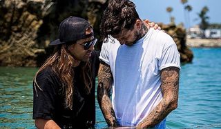 Holy water: Ryan baptises Austin