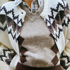 argyle knit layered cardigan over button-down shirt 