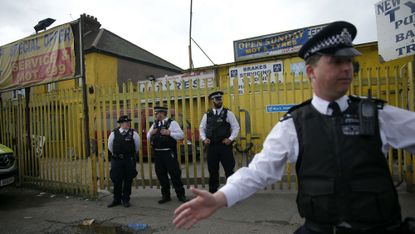 Police guard house in Barking