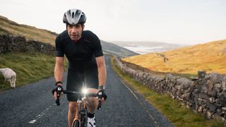 Cyclist Mark Beaumont wearin Altura bibshorts and clothing