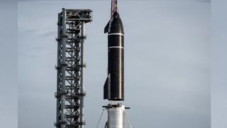 SpaceX's first orbital Starship SN20 is stacked atop its massive Super Heavy Booster 4 for the first time on Aug. 6, 2021 at the company's Starbase facility near Boca Chica Village in South Texas. They stood 395 feet tall, taller than NASA's Saturn V moon rocket.