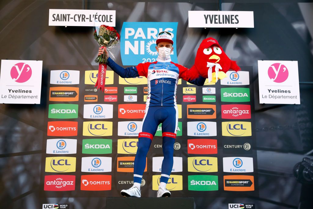 SAINTCYRLECOLE FRANCE MARCH 07 Podium Fabien Doubey of France and Team Total Direct Energie Most Combative Rider Celebration during the 79th Paris Nice 2021 Stage 1 a 166km stage from SaintCyrlEcole to SaintCyrlEcole Mask Covid safety measures Flowers Trophy ParisNice on March 07 2021 in SaintCyrlEcole France Photo by Bas CzerwinskiGetty Images