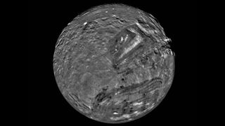 Uranus&#039; moon Miranda is shown in a computer-assembled mosaic of images obtained Jan. 24, 1986, by the Voyager 2 spacecraft. Miranda is the innermost and smallest of the five major Uranian satellites, just 480 kilometers (about 300 miles) in diameter. Nine images were combined to obtain this full-disc, south-polar view.