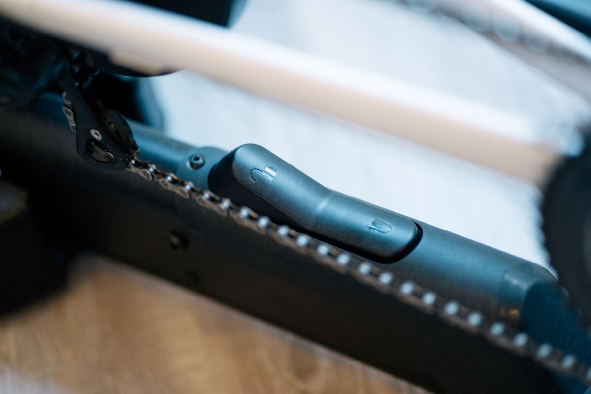 A lock and unlock switch on the base of a wahoo kickr move indoor trainer