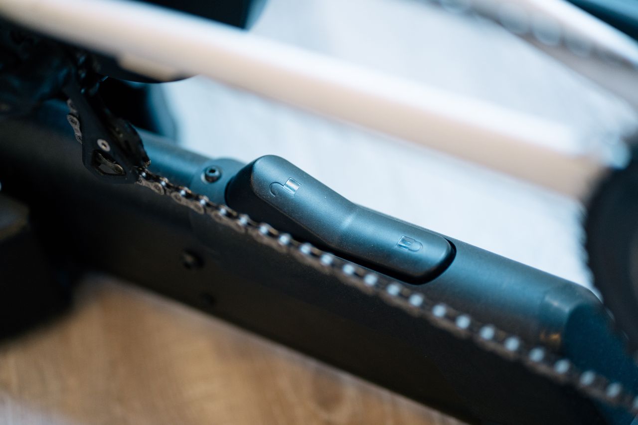 A lock and unlock switch on the base of a wahoo kickr move indoor trainer
