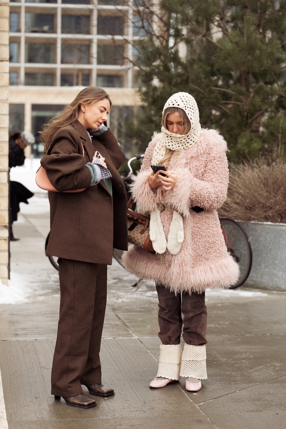 models at copenhagen fashion week wearing fur coats and colorful coats