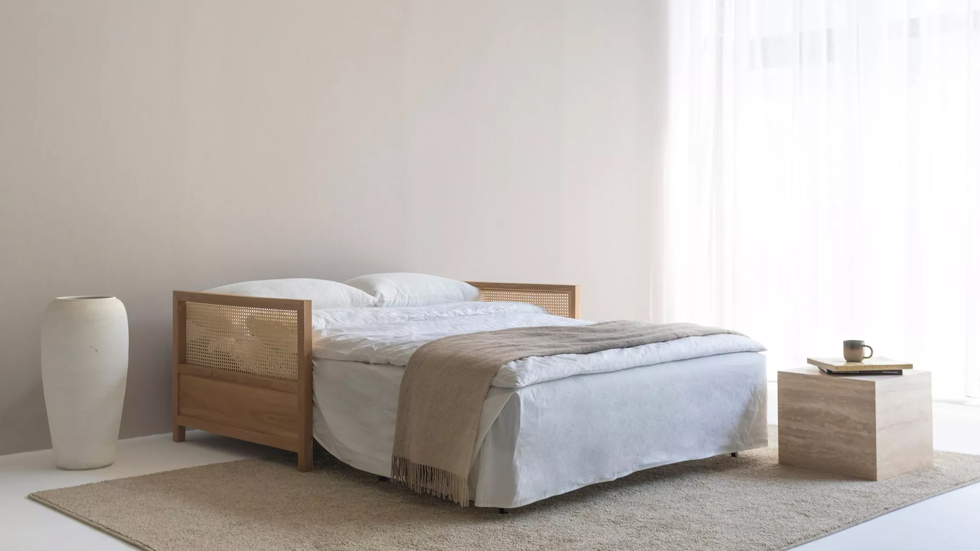 Innovation Living can sofa bed in white and black