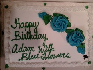 happy birthday cake with blue flower