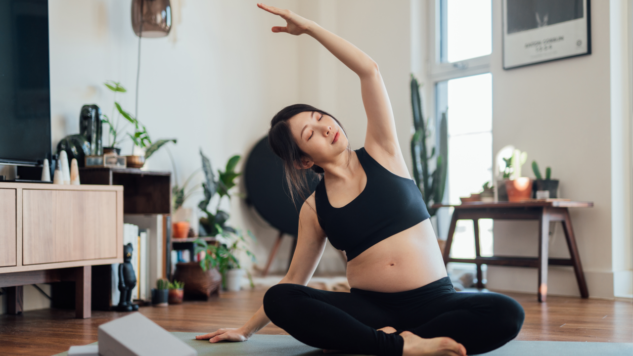 Woman doing the mermaid stretch