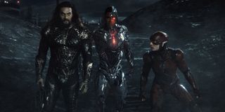 Aquaman, Cyborg, and The Flash stand on the battlefield in Zack Snyder's Justice League