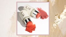 Two shades of the ILIA Multi-Stick blush in a pink and orange shade picture line on their side, with swatches of the product/ in a cream and gold paint stroke template