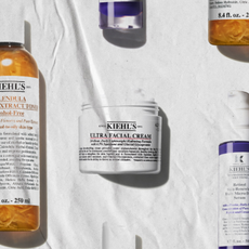Kiehl's beauty products on a white fabric