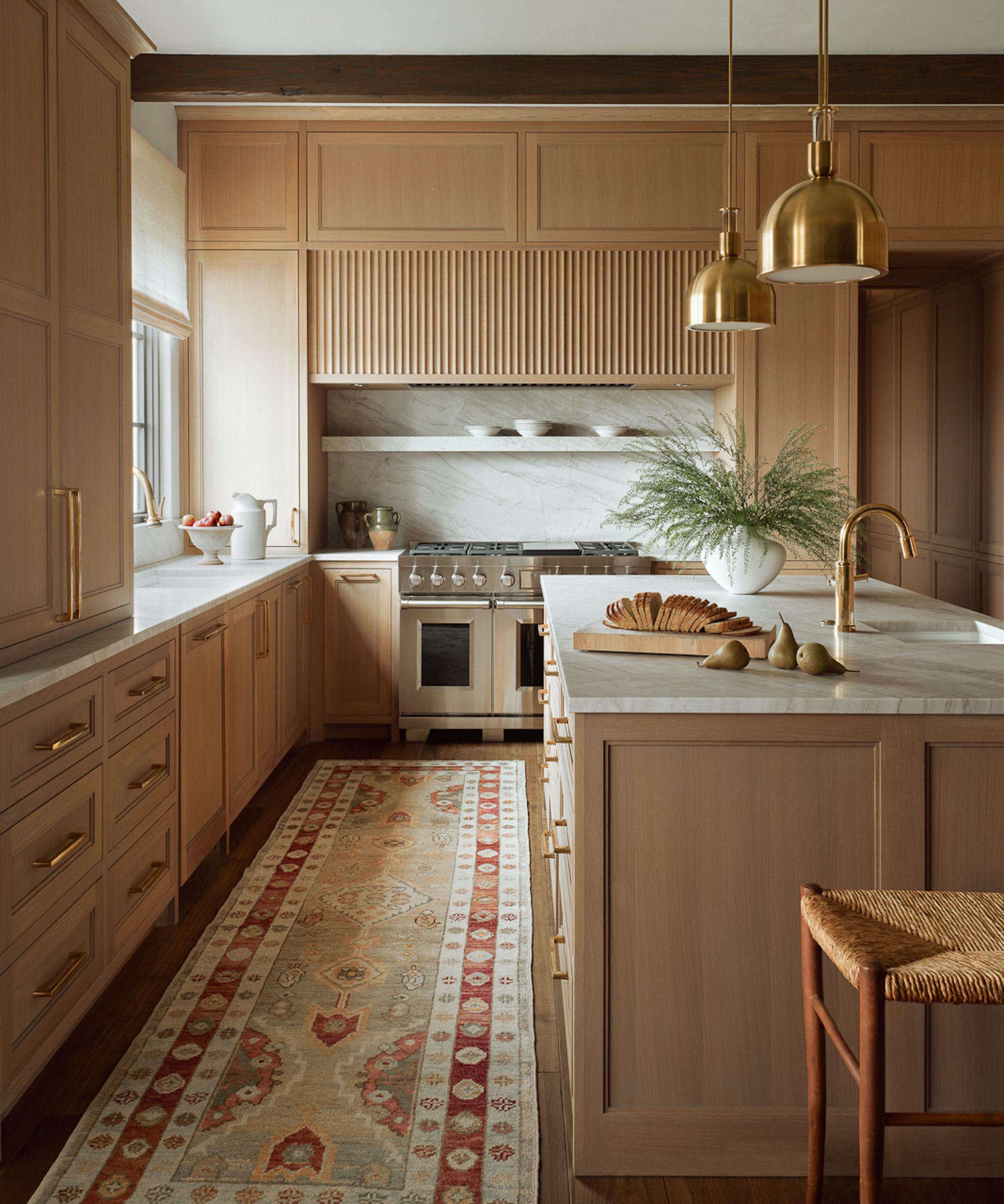 timber kitchen with island and patterned runner rug