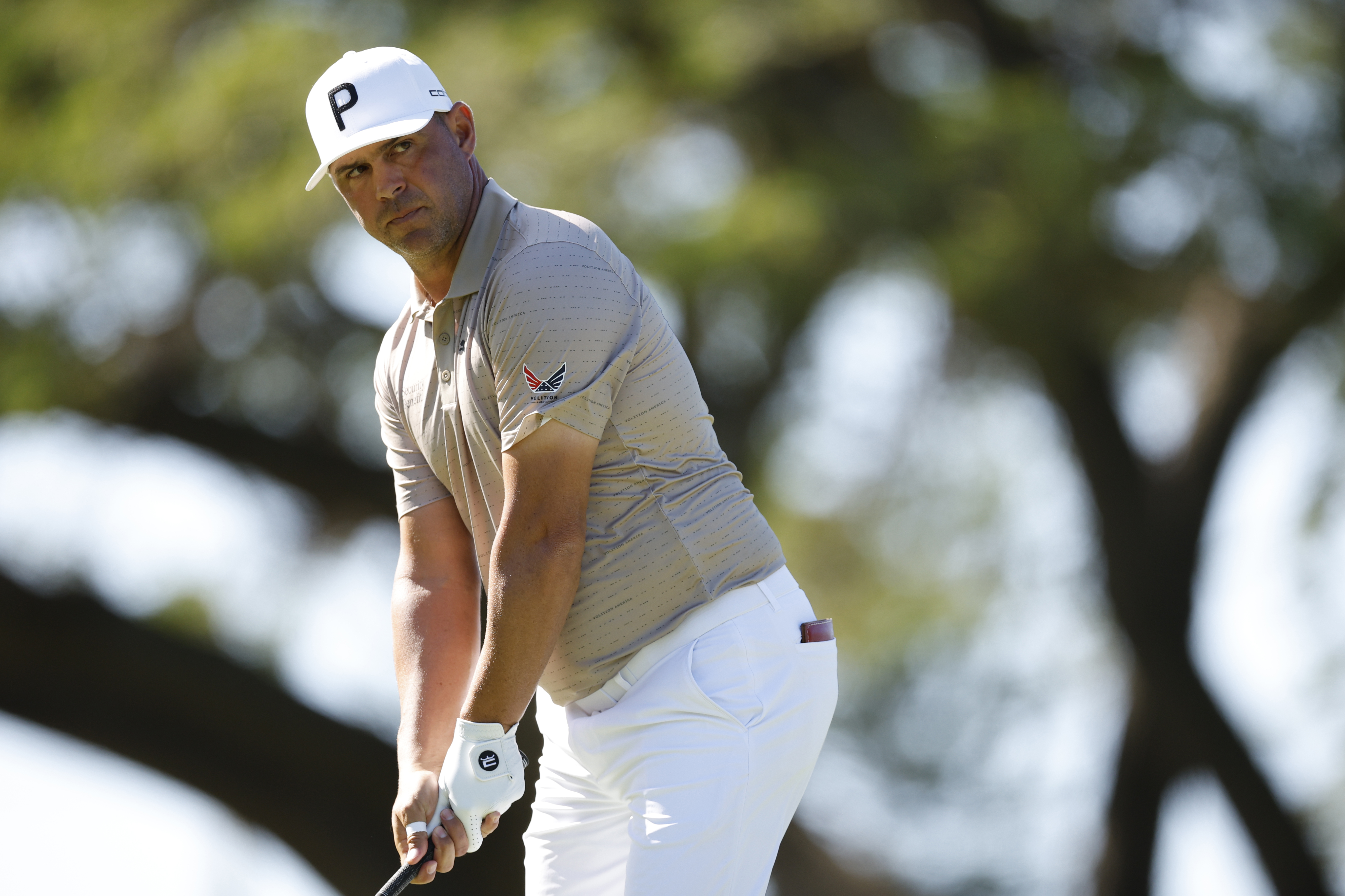 Gary Woodland lines up a tee shot