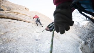 Two people sport climbing