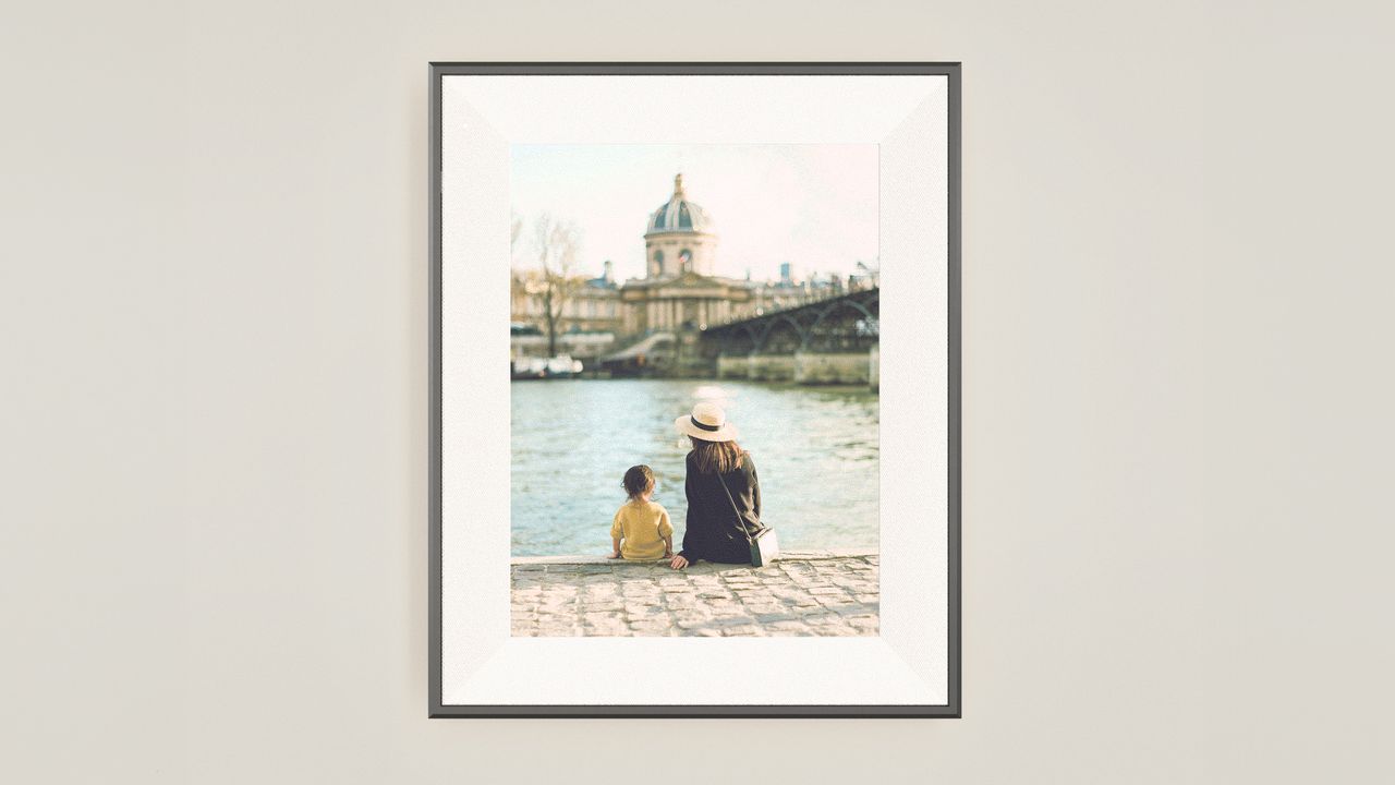Aura E Ink digital frame on a wall