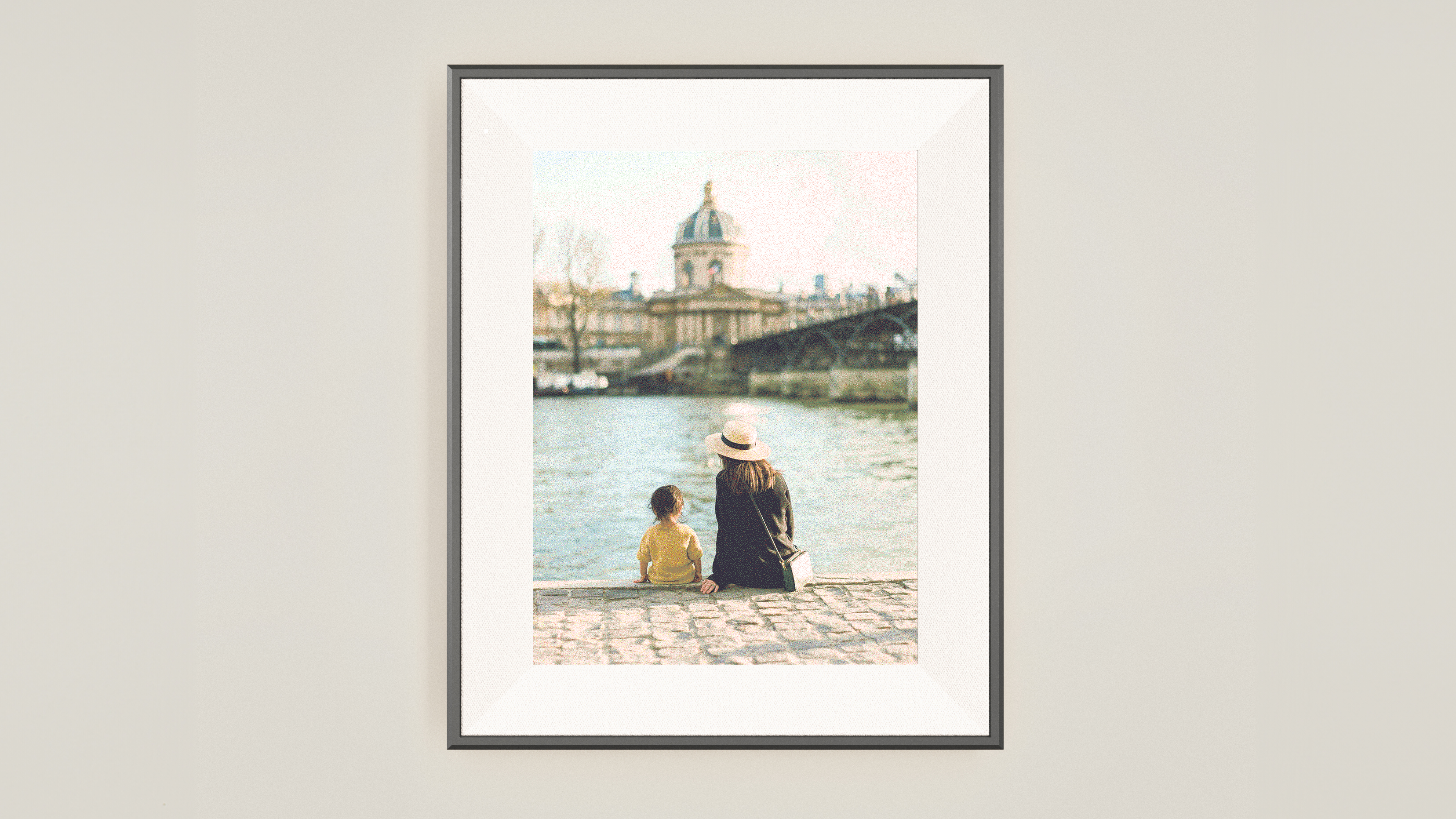 Aura E Ink digital frame on a wall