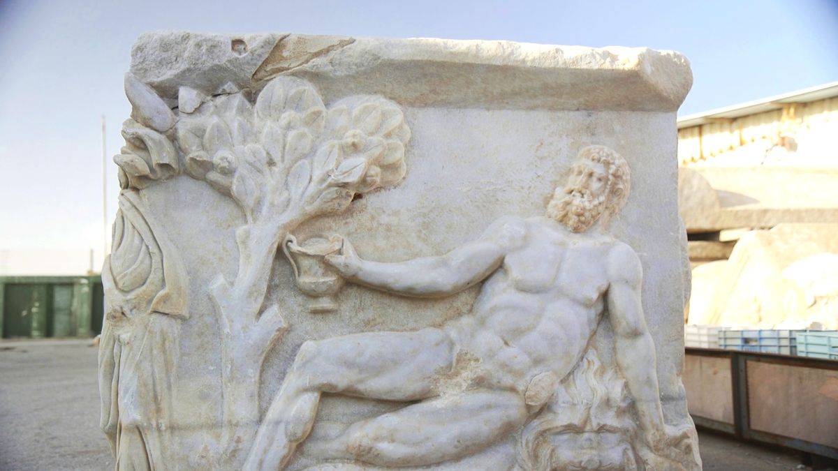 'Extraordinary' sarcophagus discovered in Israel shows carving of Dionysus beating Hercules in a drinking contest