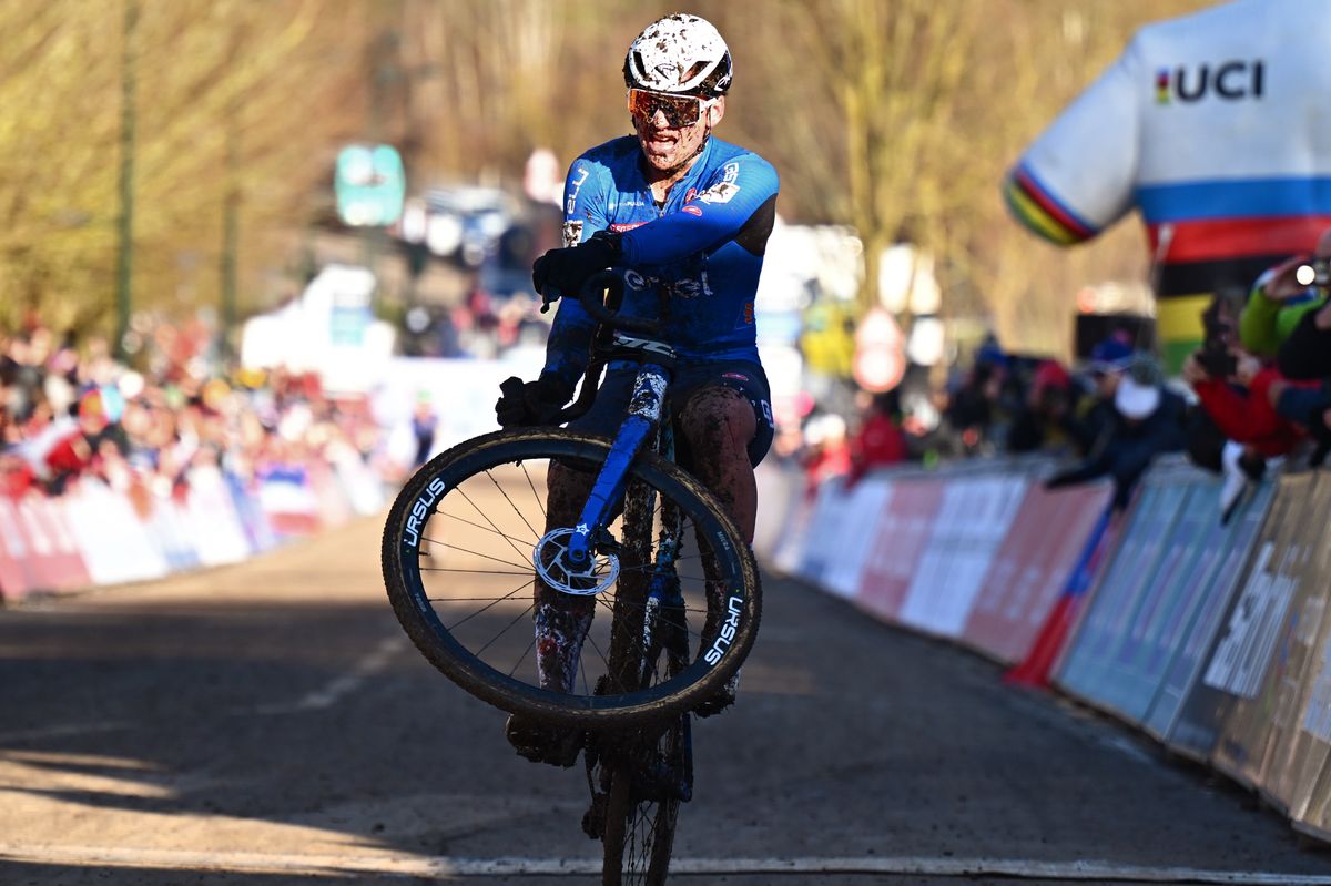 Agostinacchio wheelies over the line in celebration