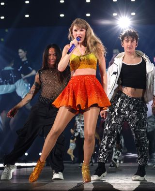 Taylor Swift 1989 outfits new era tour looks chiefs colors orange and yellow