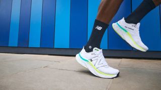 Close-up of runner’s feet and legs, wearing New Balance Fresh Foam X More v4