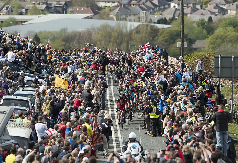 Not much room for the peloton to ride on with all the fans packing the road