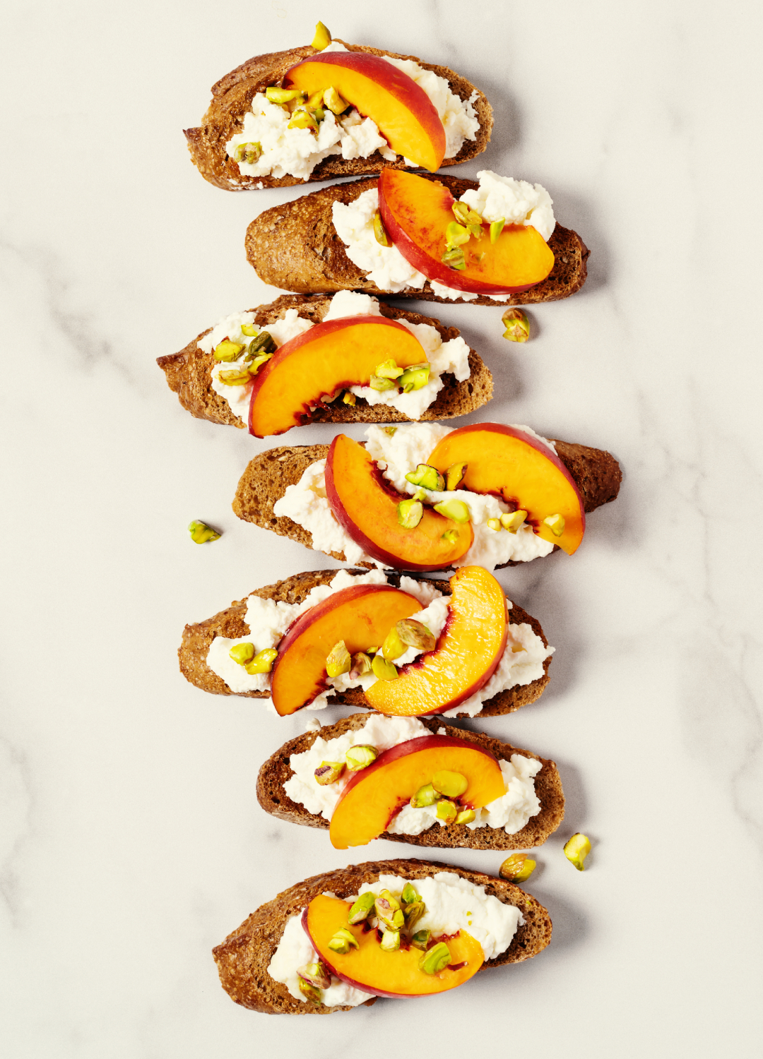 Peach and ricotta toasts