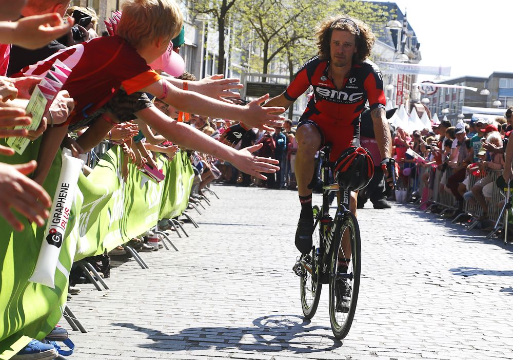 BMC's Daniel Oss greets the crowd at the start.