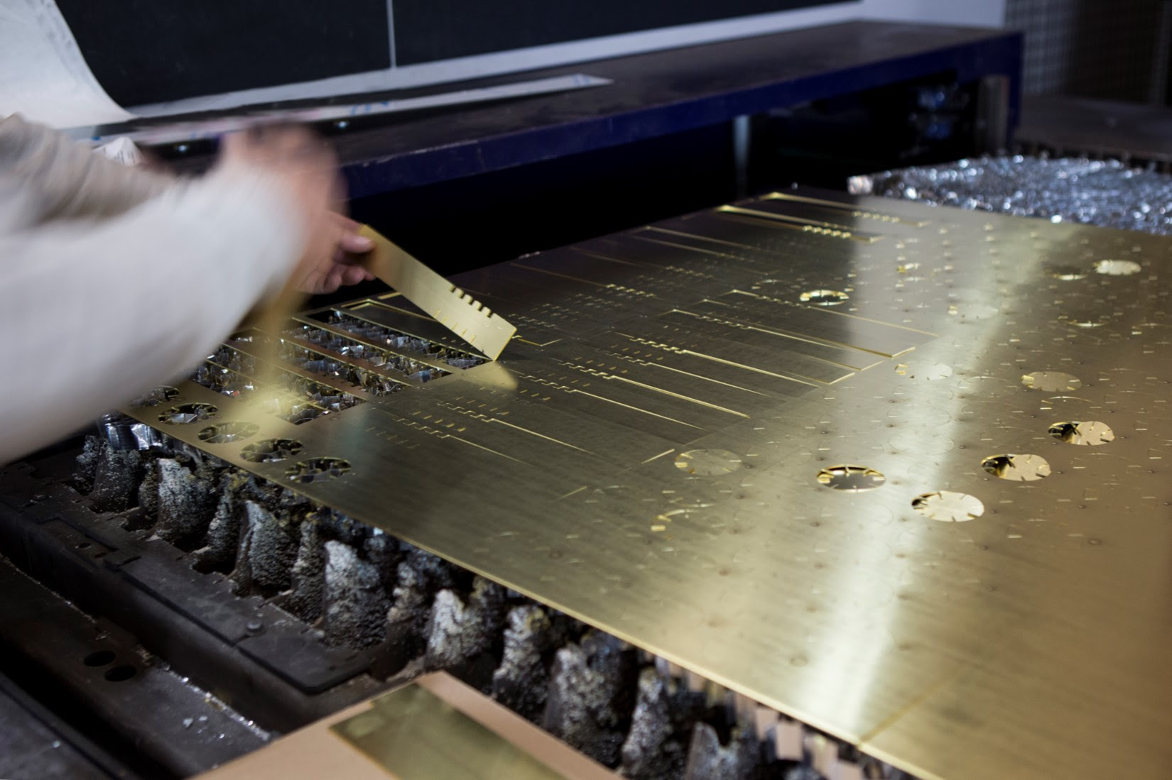Each fin is carefully cut with a laser engraver