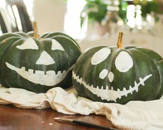 pumpkins with painted faces