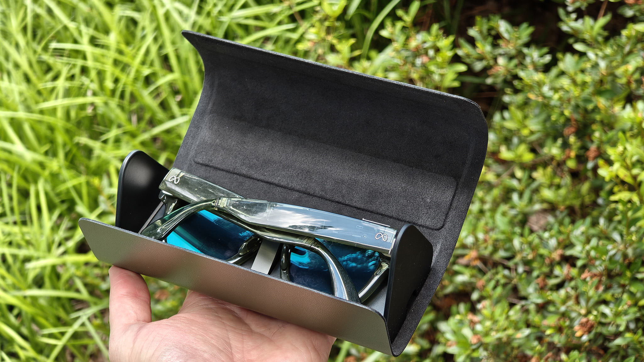 The green charging case that came with green Meta Fury smart glasses
