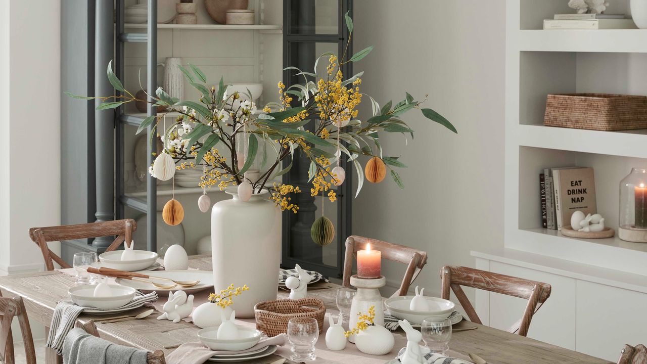 An Easter-themed dining tablescape with an Easter tree