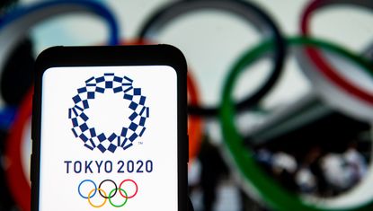  In this photo illustration a Tokyo 2020 Olympics logo seen displayed on a smartphone. (Photo Illustration by Mateusz Slodkowski/SOPA Images/LightRocket via Getty Images)