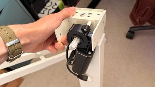 An Autonomous SmartDesk 5 being put together and installed in an office.