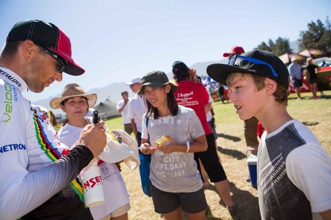 Christoph Sauser signs autographs