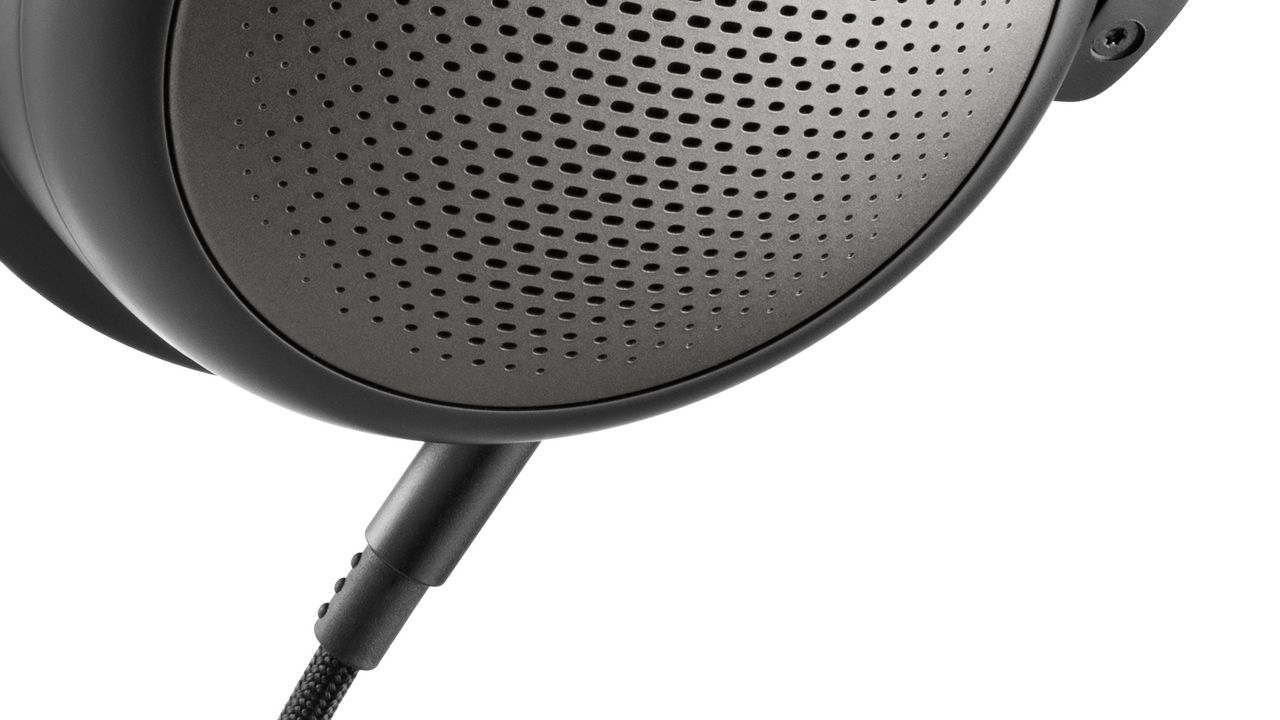 A close-up of the wired that is attached to a pair of Beyerdynamic T1 (3rd Gen) over-ear headphones.