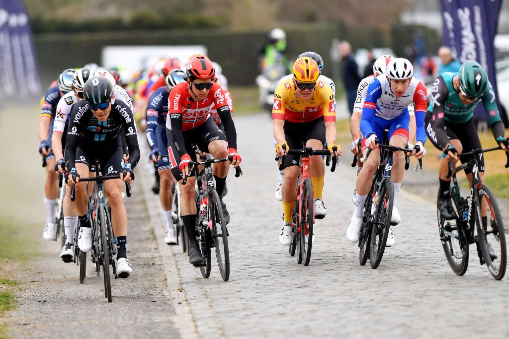 NOKERE BELGIUM MARCH 16 LR Cedric Beullens of Belgium and Team Lotto Soudal Anders Skaarseth of Norway and Uno X Pro Cycling Team Lewis Askey of United Kingdom and Team Groupama FDJ compete during the 76th Danilith Nokere Koerse 2022 Mens Elite a 1898km one day race from Deinze to Nokere NokereKoerse DNK22 on March 16 2022 in Nokere Belgium Photo by Luc ClaessenGetty Images