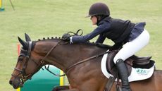 grace-debney-and-ZARINA-DE-VIDAU-jumping-BR102556-sportfot-1.jpg